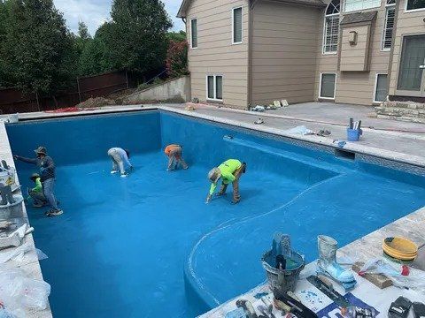 Workers Plastering the Pool — Shawnee, KS — Mid-West Plastering LLC