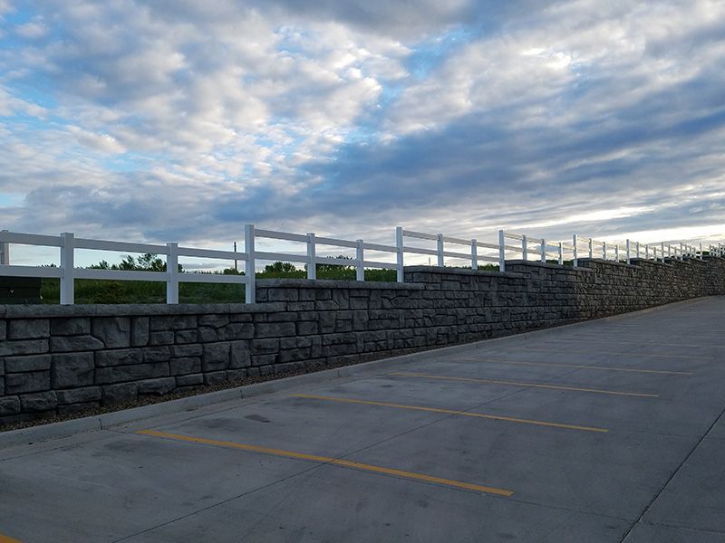 retaining wall with wooden fence
