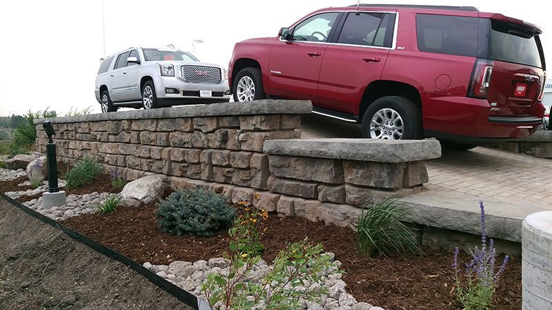 tiered retaining wall in parking lot