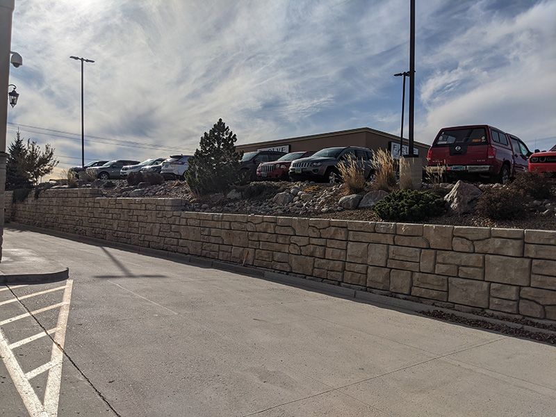 retaining wall on outer edge of parking lot