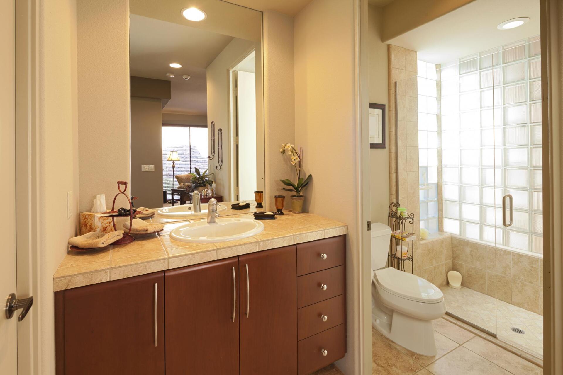 bathroom with many cabinets