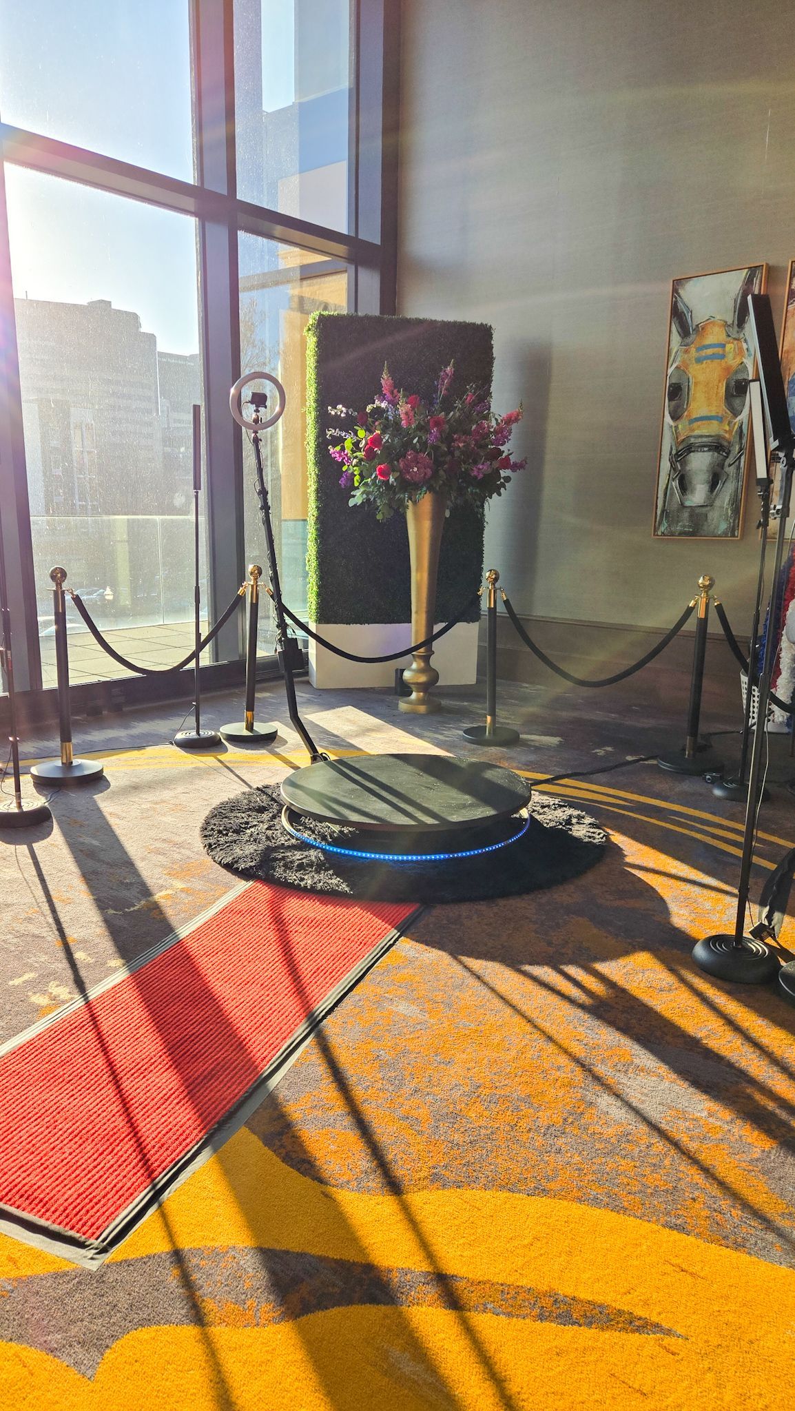 There is a red carpet in the middle of the room.