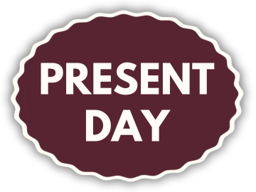 A sticker that says present day on it