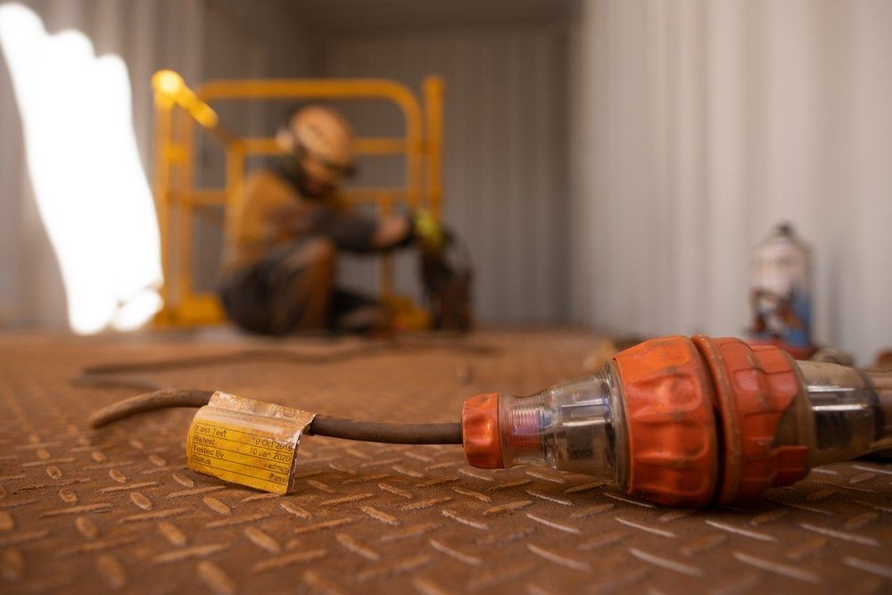 An Orange Industrial Connector — Test Right Services in Ingham, QLD