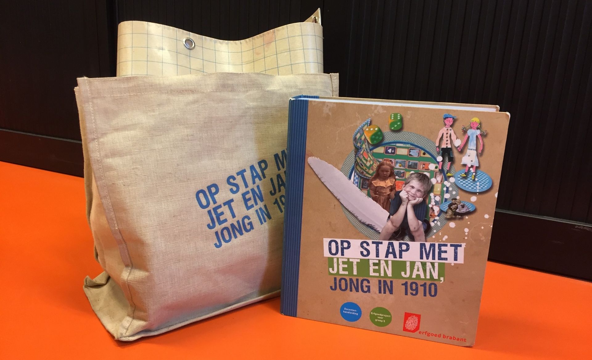 Book and paper bag with text 