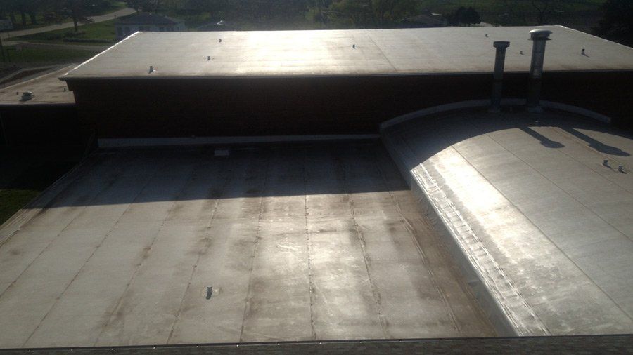 Flat Roof Restoration — Old Roofing of a Building in Mission, KS