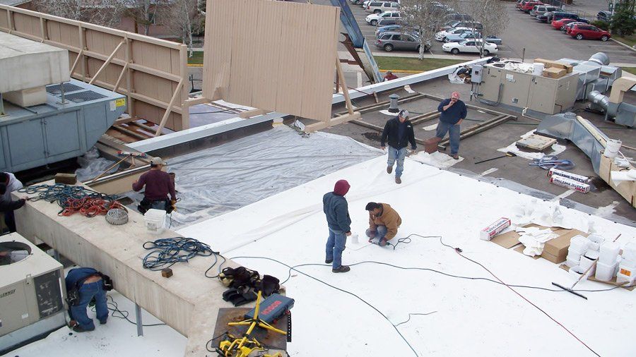 Skyline Roofing and Space Sheeting — Contractors Doing Their Work in Mission, KS