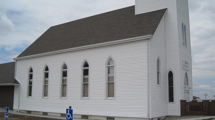 Ploy Iso — Church with White Sidings and Gray Roofing in Mission, KS