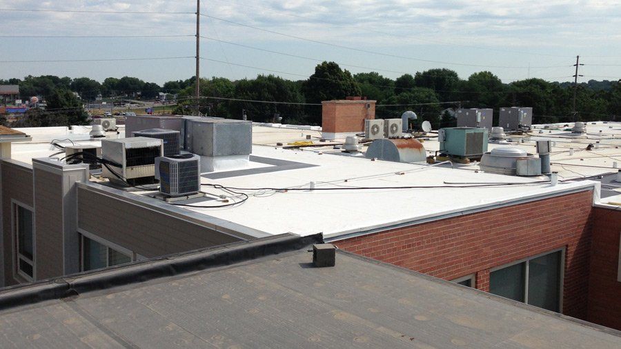 Foam Roofing — Roof of a Commercial Building in Mission, KS