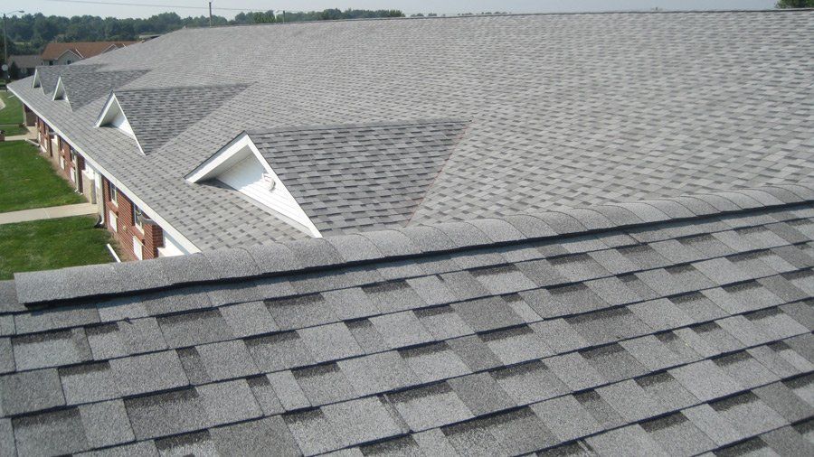 Skyline Roofing Contractor — Newly Installed Shingles in Mission, KS
