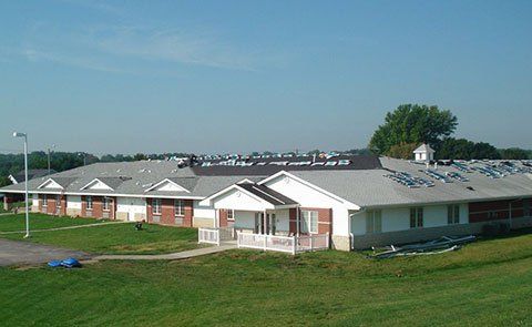 Roofing Contractors — Newly Installed Roof for Residential Homes in Mission, KS