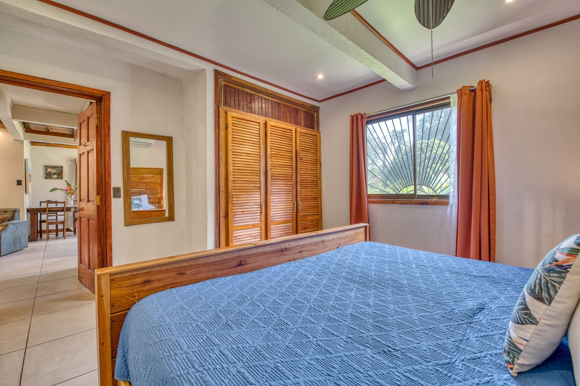 There is a large bed in the middle of the room.