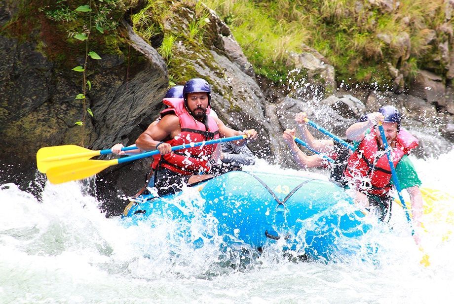 A group of people are rafting down a river.