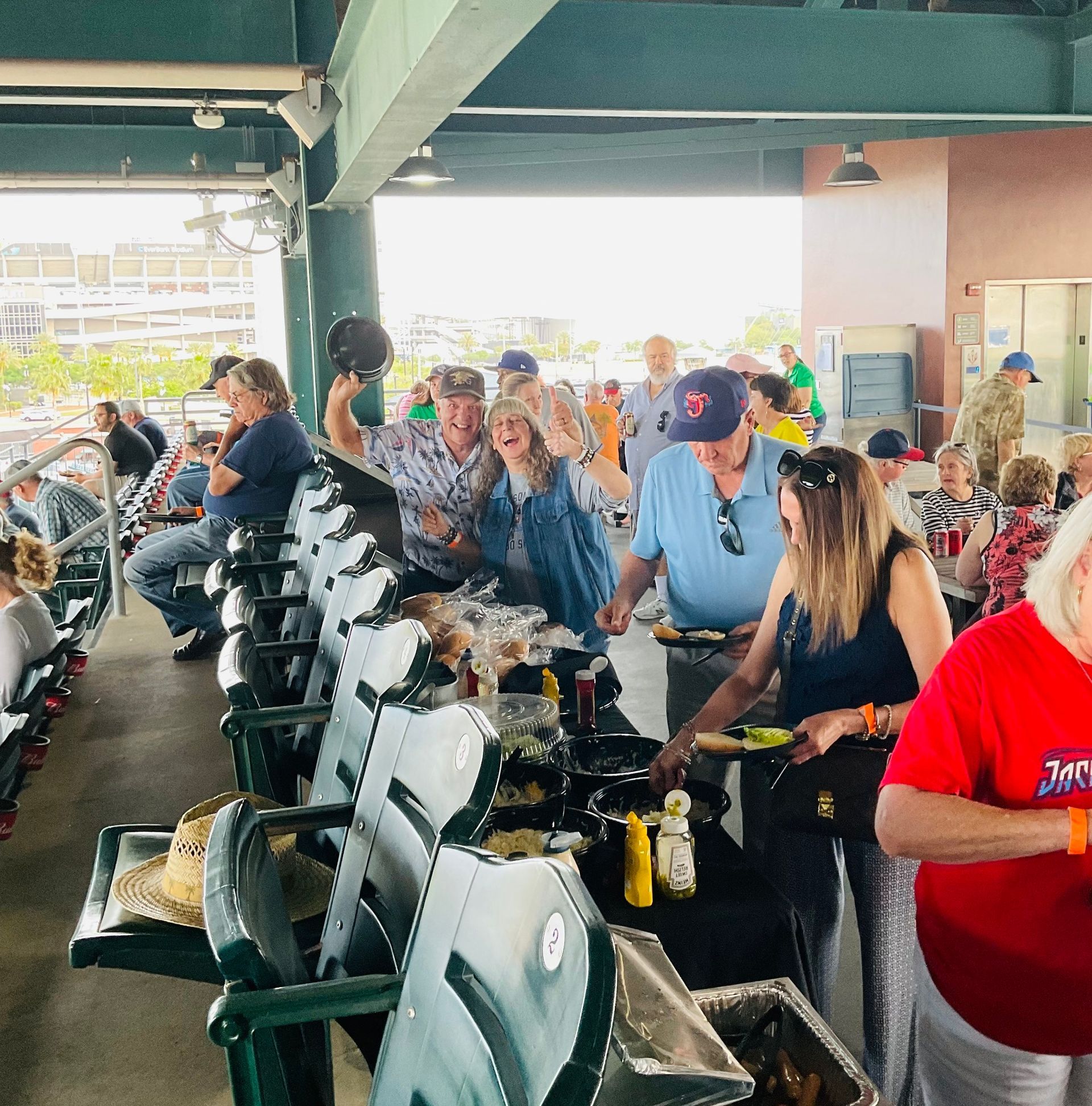 A woman in a red shirt that says ' america ' on it