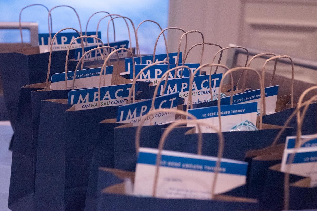 A row of impact bags are lined up on a table