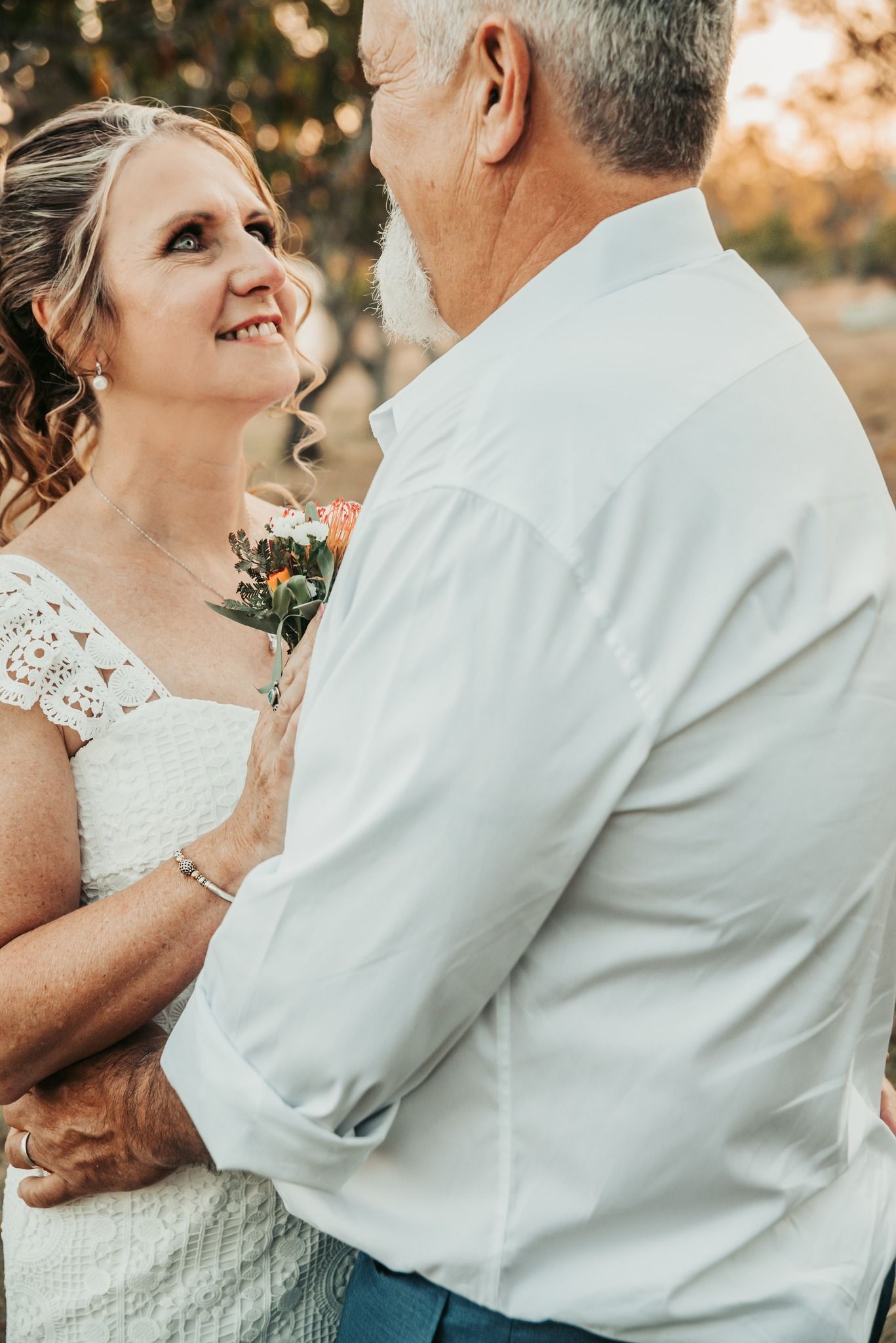 Couple Gazing at Each Other Lovingly — Feathers & Lace Photography in Tarzali, QLD
