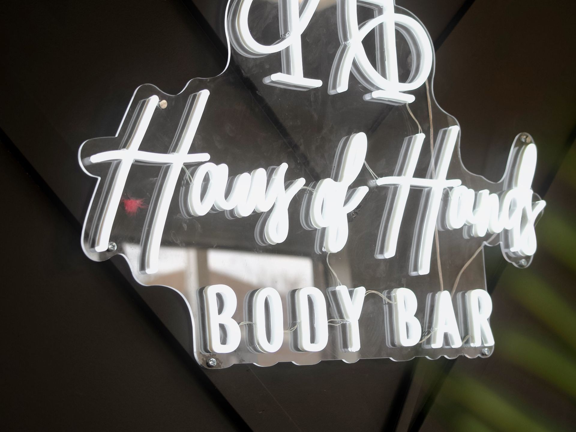 A woman is getting a head massage at a spa.