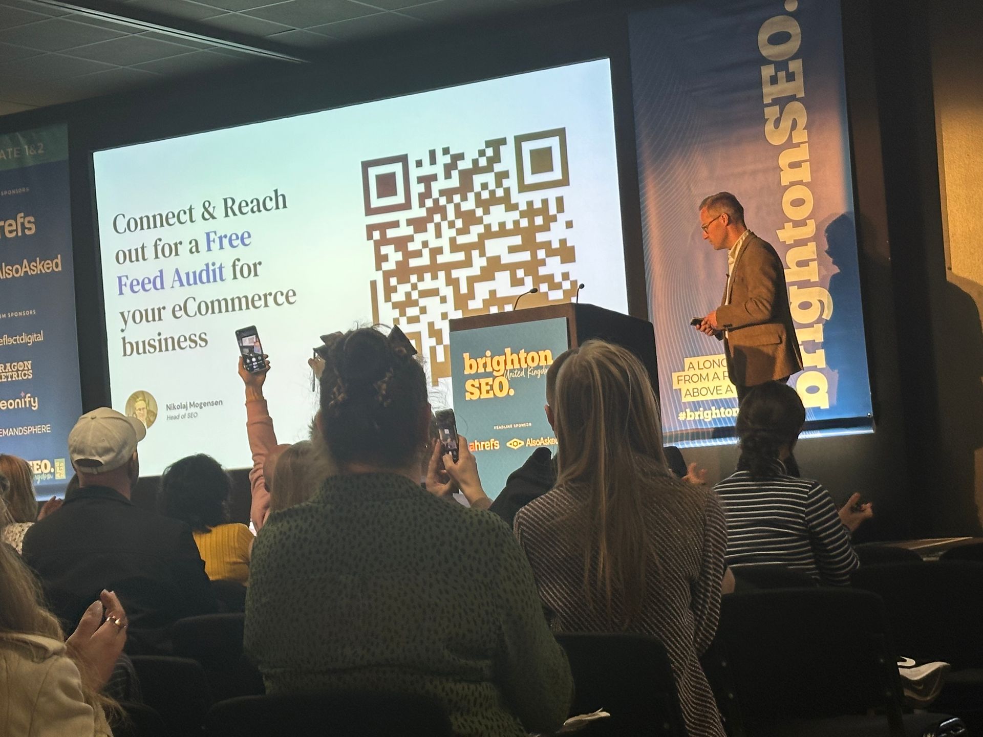 A man is giving a presentation at a brighton seo conference