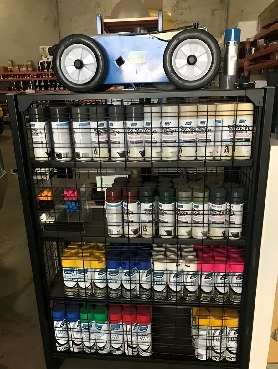 A Shelf Filled with Bottles of Spray Paint — Central West Paint Supplies in Dubbo, NSW