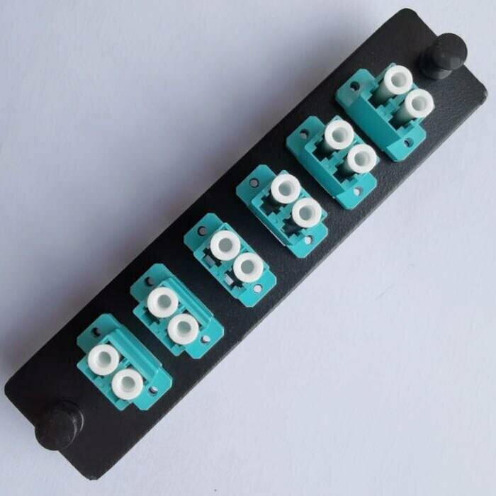 A row of blue and white connectors on a black board