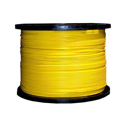 A spool of yellow wire on a wooden spool on a white background.