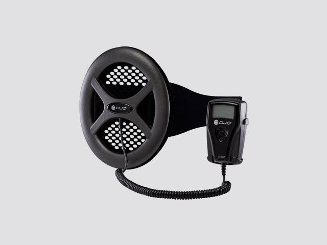 Black handheld hair dryer with cord and concentrator attachment on a light background