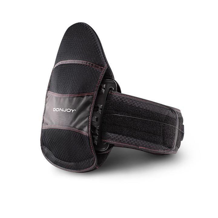 Black adjustable hand brace with a wrist strap on a white background