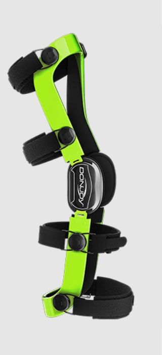 Black and neon green adjustable pet leg brace with straps and padded support