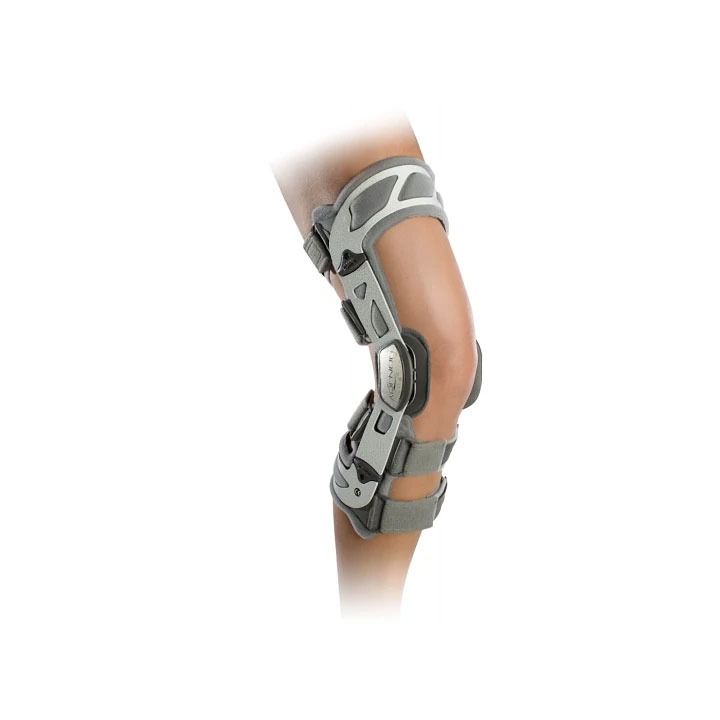 Gray orthopedic knee brace on a bent leg with metal side supports and straps