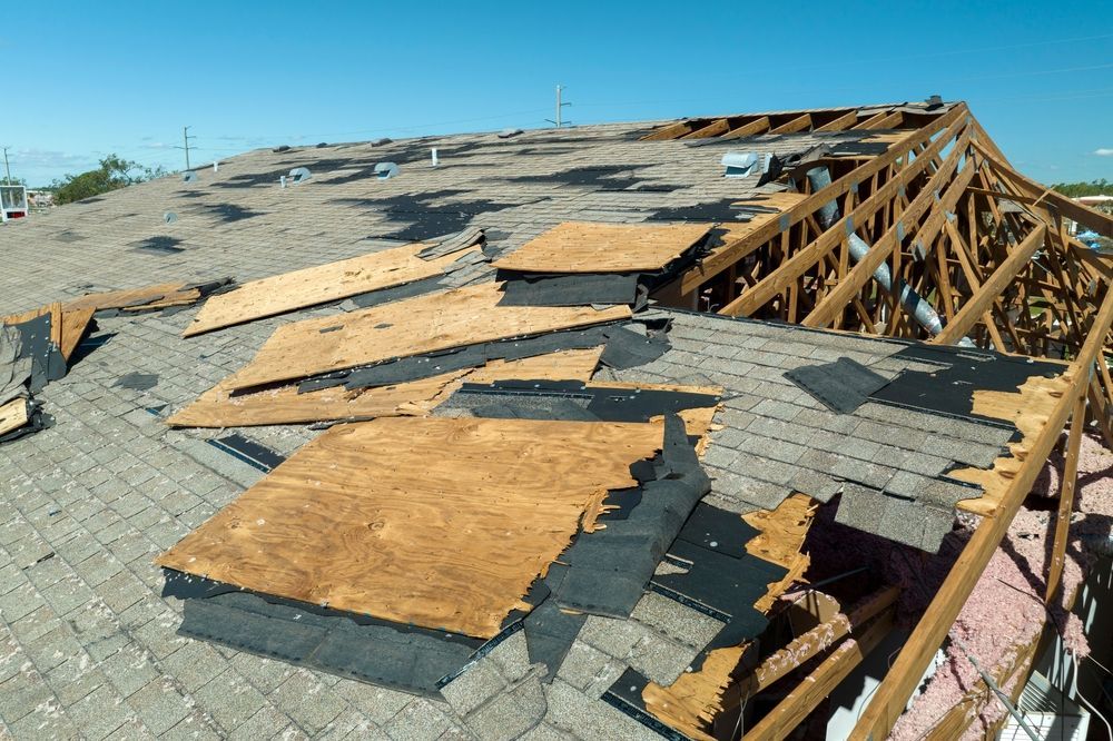 A roof with a lot of pieces of wood on it