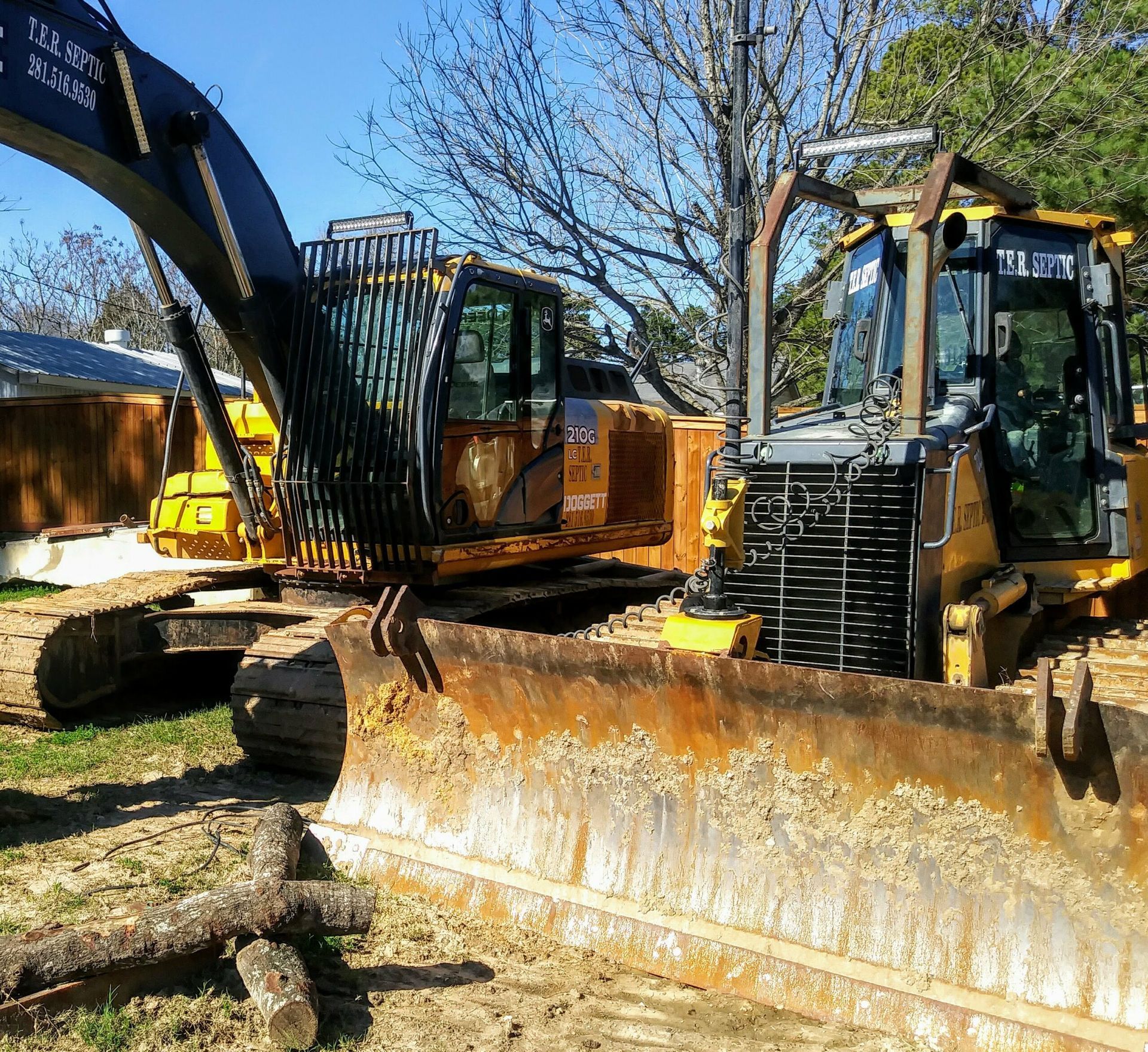 Excavators and bulldozers performing site preparation and earthmoving tasks.