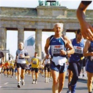 A group of runners with one wearing the number 2269