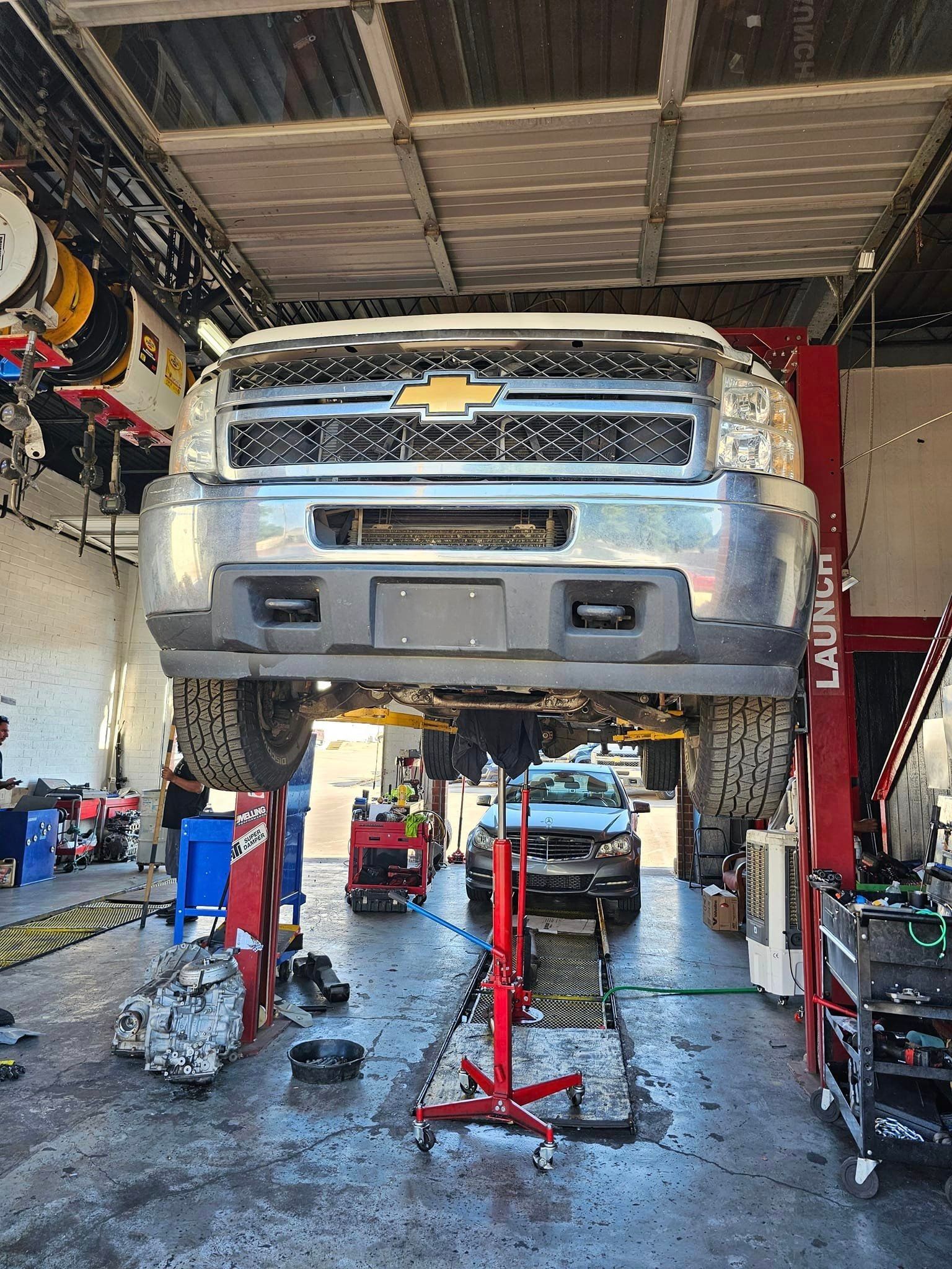 Car Lift at the Garage — Arlington, TX — V & V Auto Repair and Tires