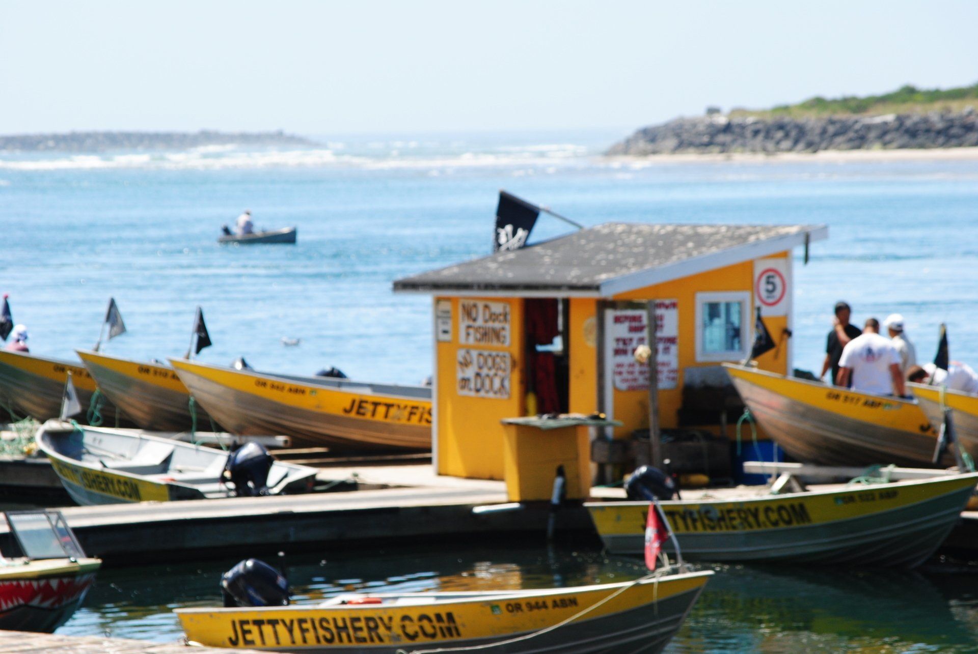 Jettyfishery.com is written on the side of a boat