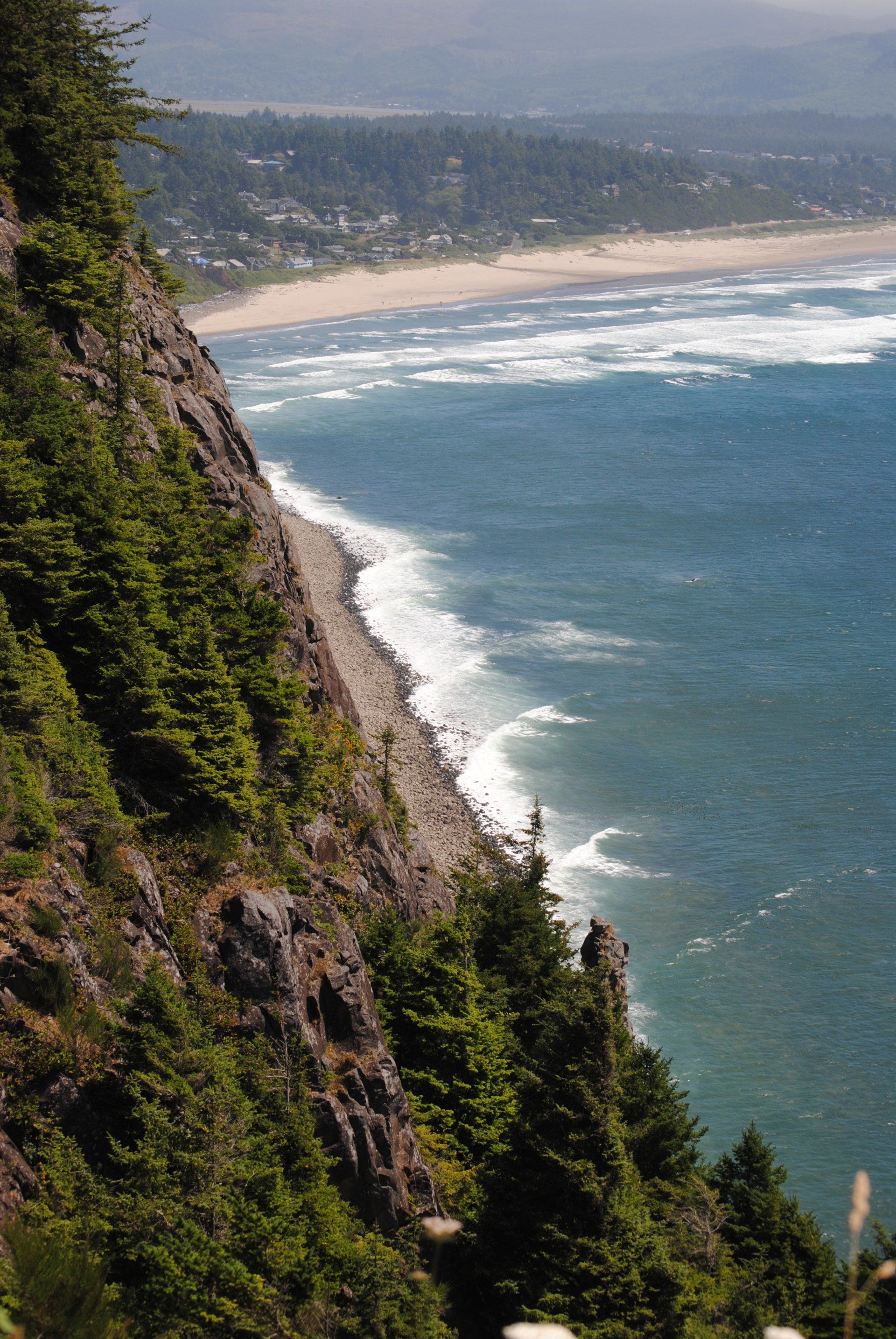 A view of a cliff overlooking a body of water