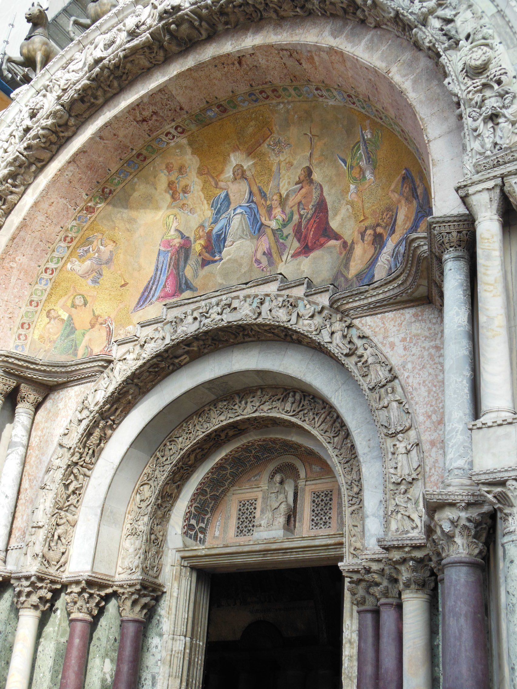 A church with a painting on the front of it