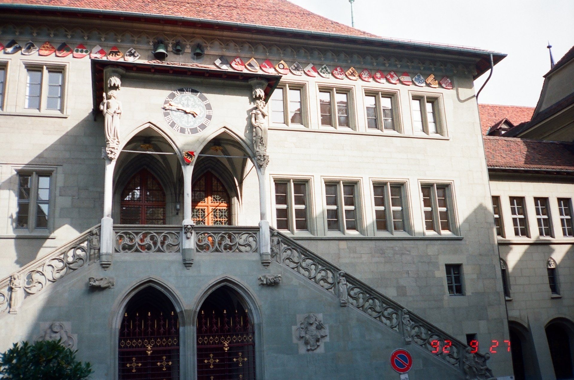 A large building with a clock on the top of it
