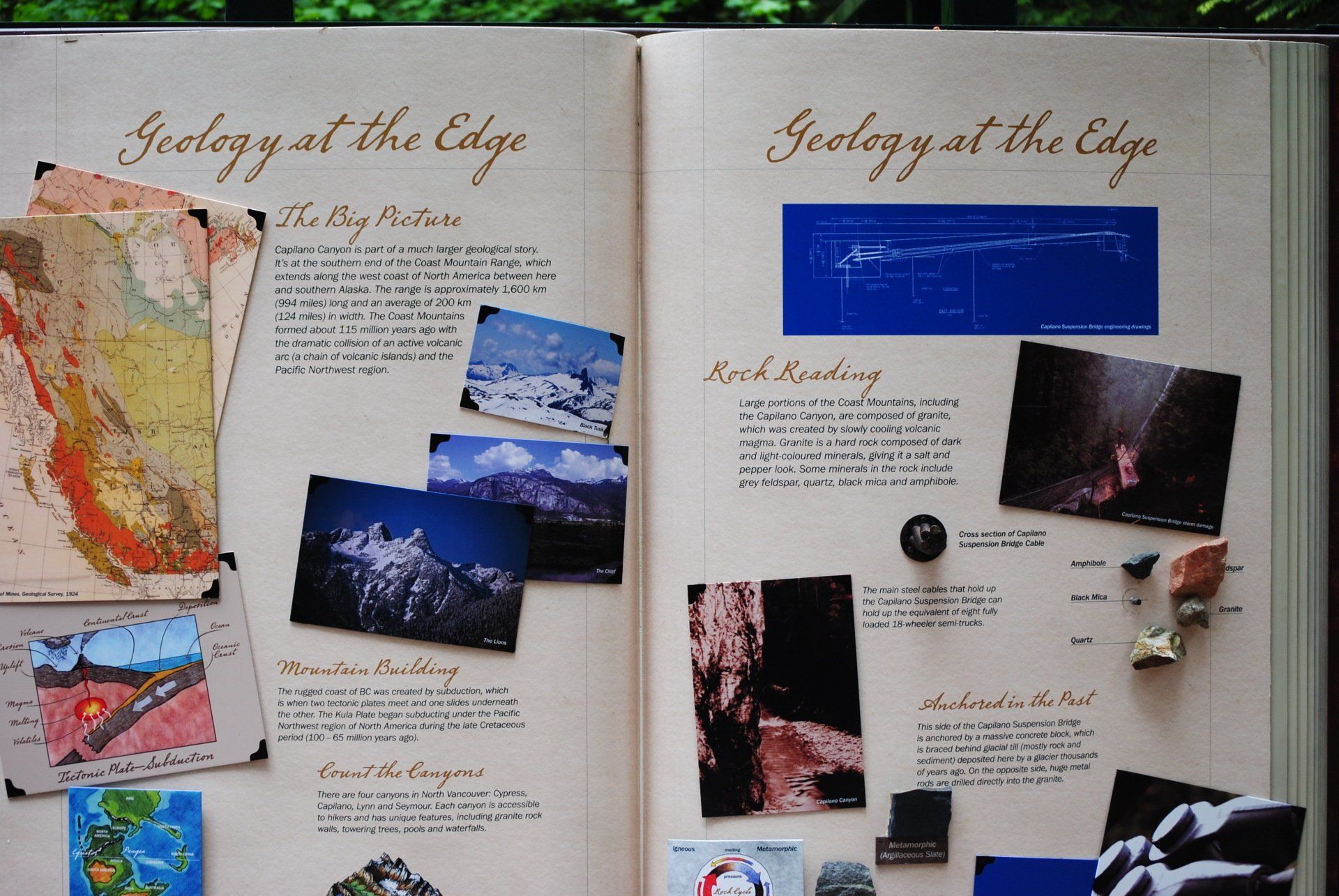 A book is open to a page about geology at the edge