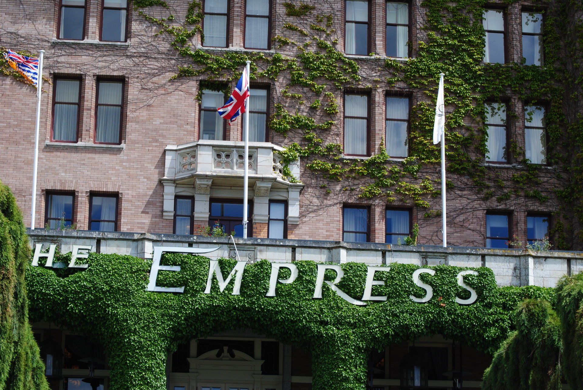A large brick building with the empress written on it