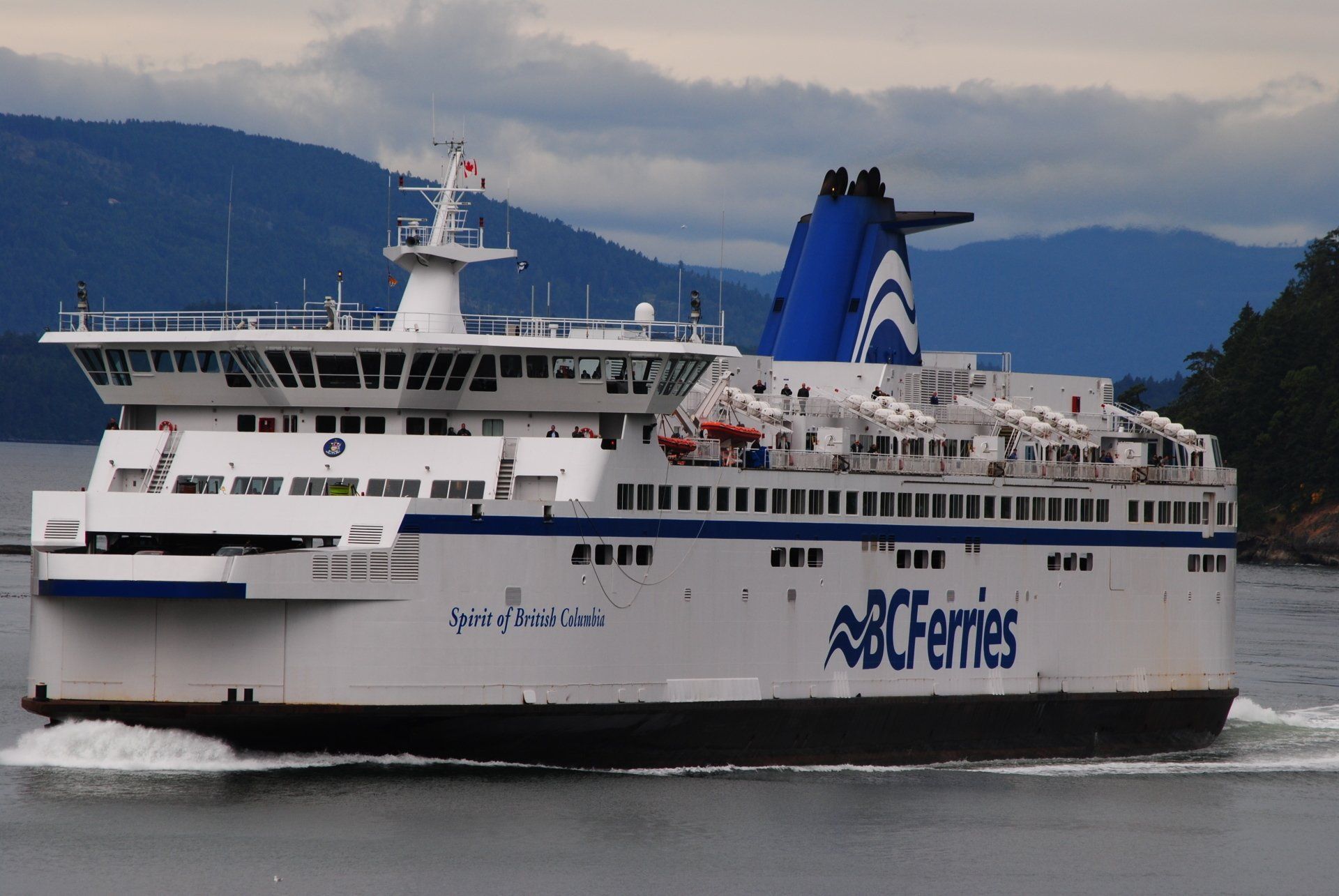 A bc ferries ship is floating on the water