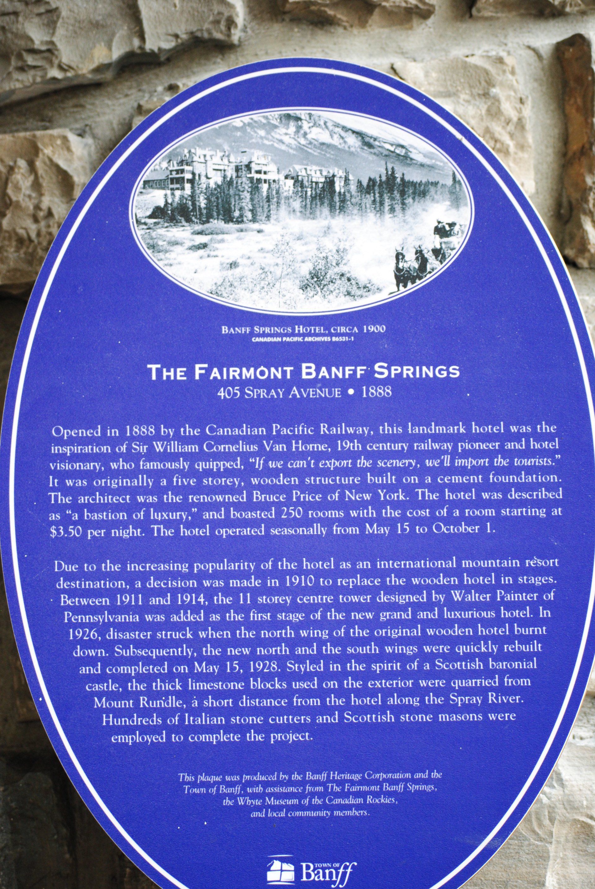 A blue sign that says the fairmont banff springs on it