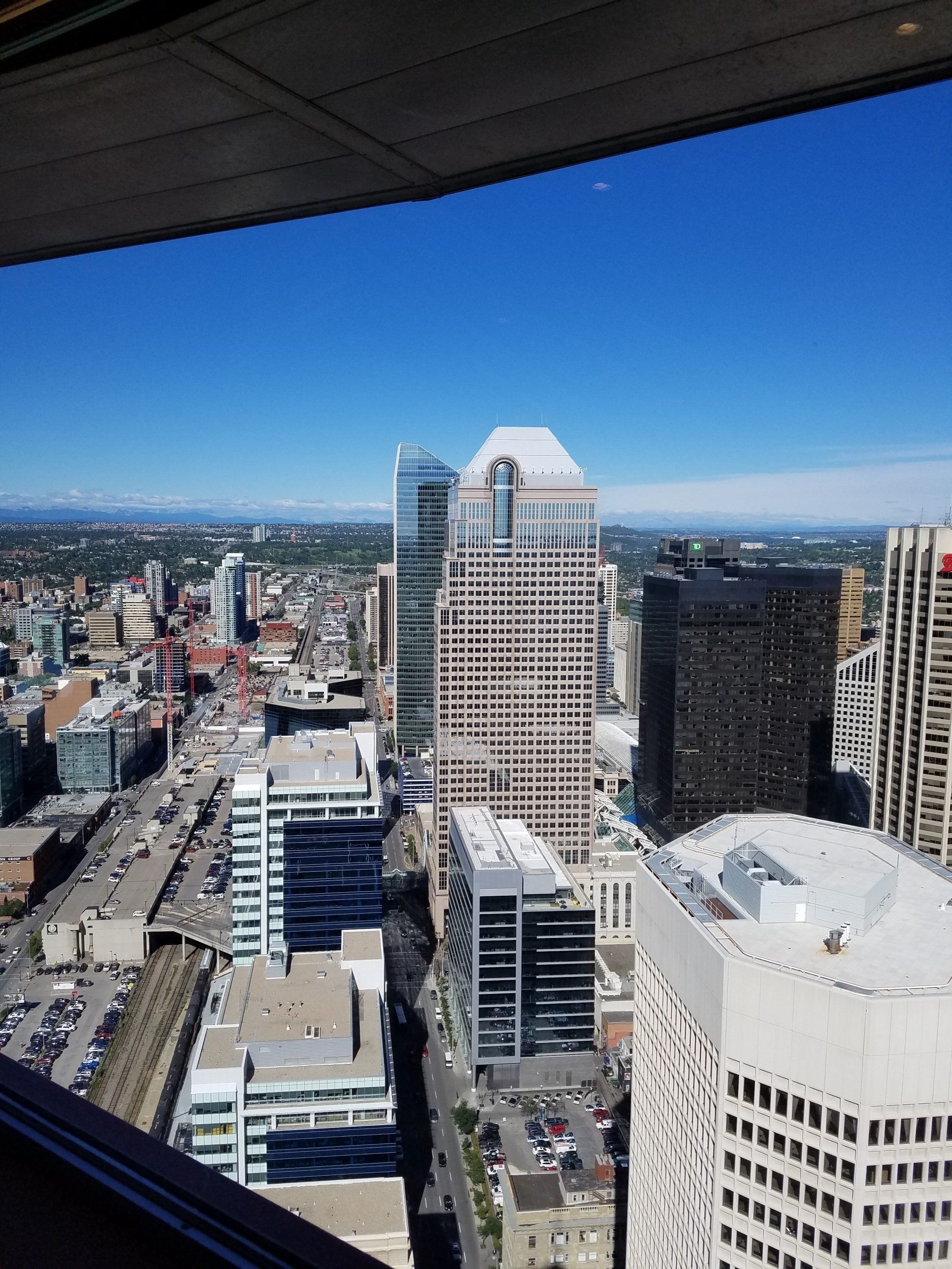 An aerial view of a city with lots of tall buildings