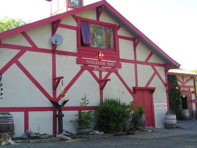 A red and white building with a sign that says ' n's ranch inn ' on it