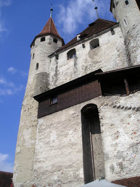 A large stone building with a tower on top of it