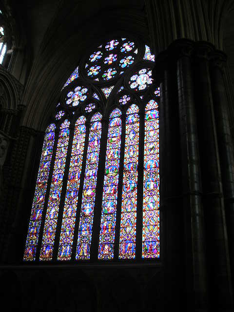 A large stained glass window in a church