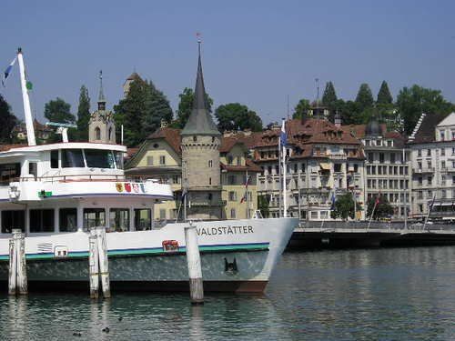 A boat with the name gustav fr on the side of it