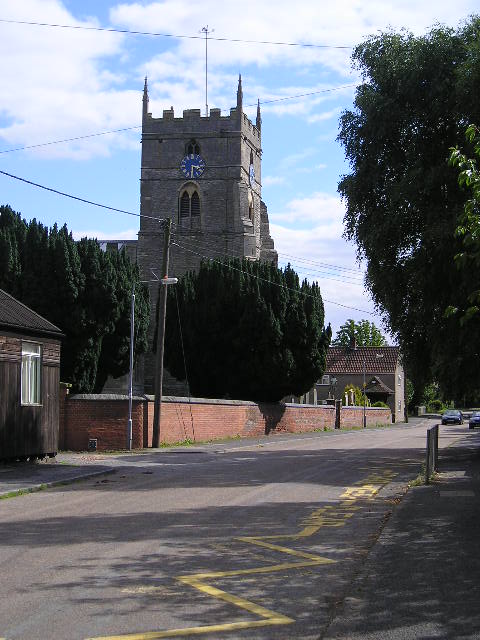 A church with a clock on the top of it