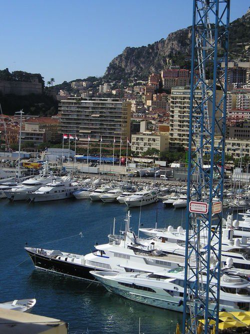 A large number of boats are docked in a harbor