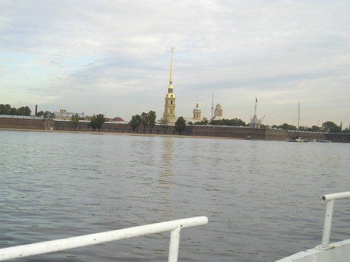 A large body of water with a tower in the distance