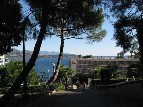 A view of a large building overlooking a body of water